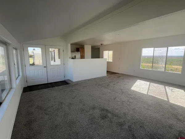 an empty room with windows