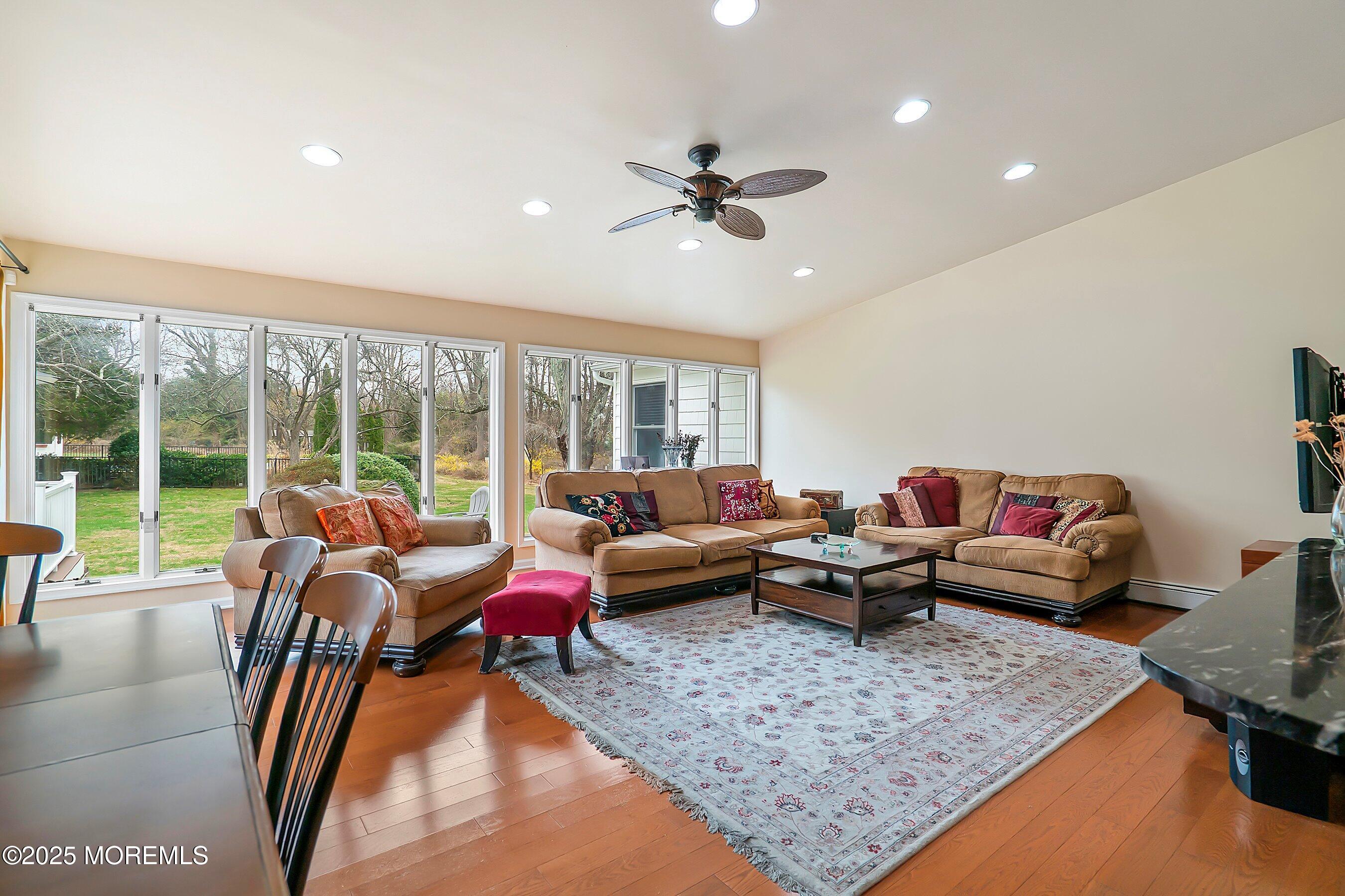 29 Holland Road Middletown, NJ 07748 - Photo 15 of 59 a living room with furniture and a rug