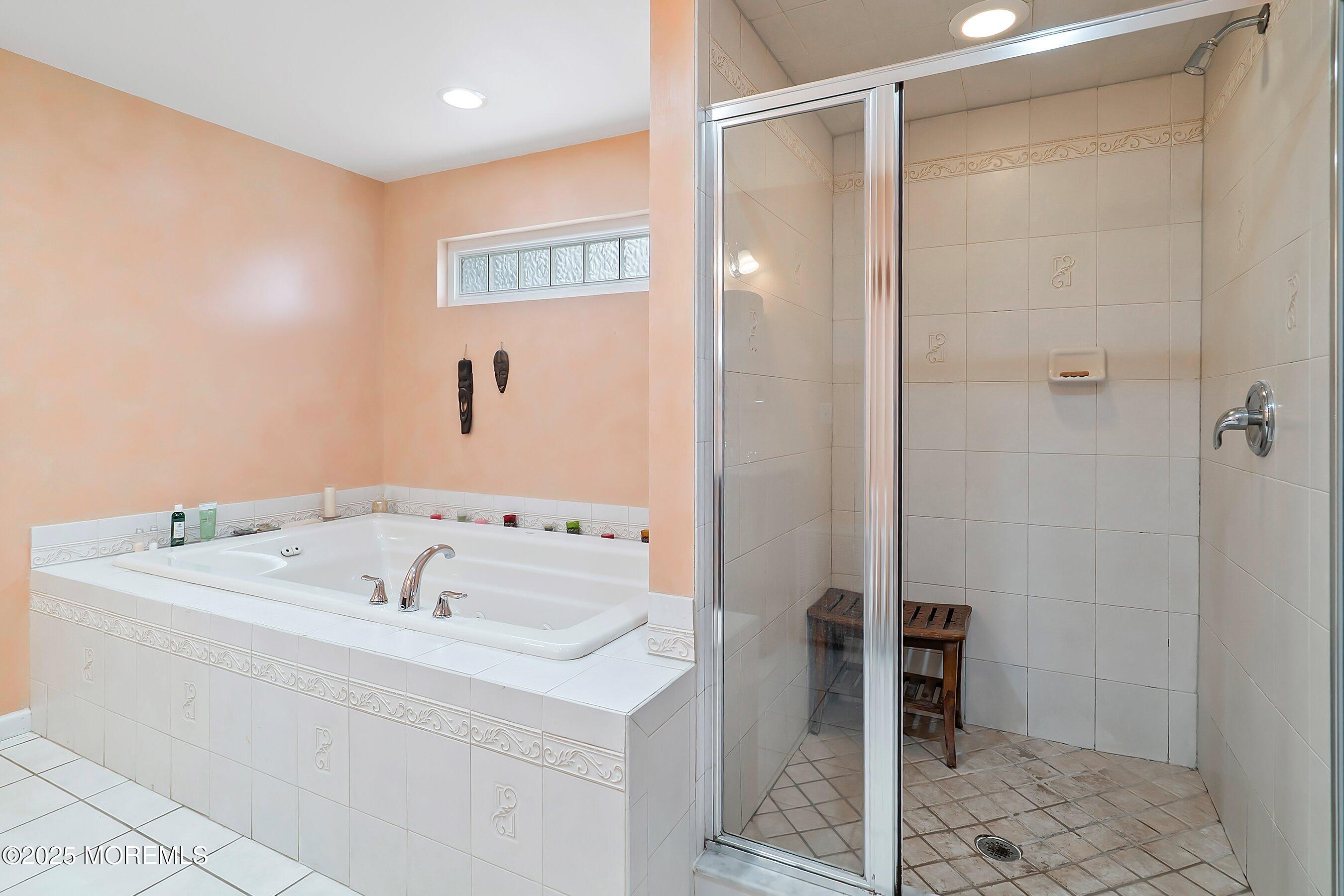 29 Holland Road Middletown, NJ 07748 - Photo 23 of 59 a bathroom with a bathtub and a sink