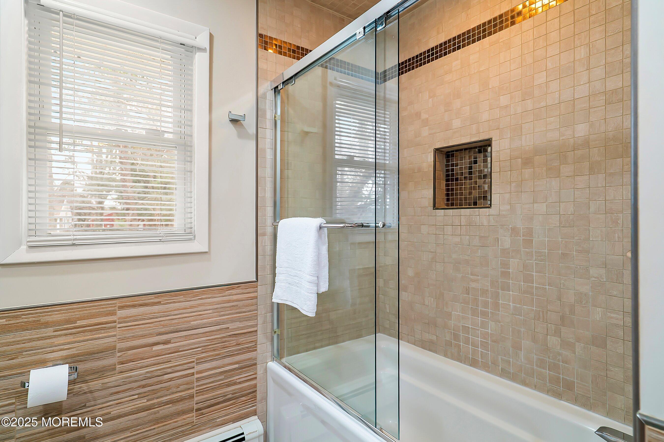 29 Holland Road Middletown, NJ 07748 - Photo 28 of 59 a bathroom with a bathtub and a shower