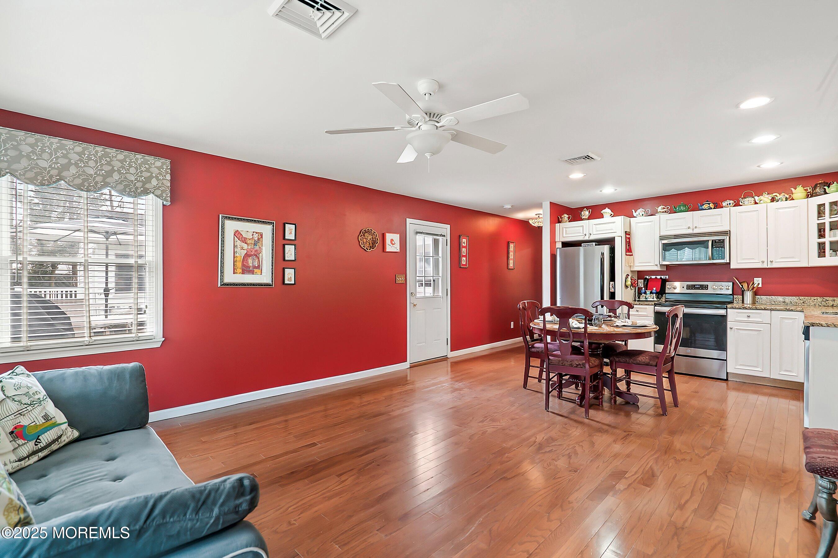 29 Holland Road Middletown, NJ 07748 - Photo 34 of 59 a workspace with furniture window and wooden floor