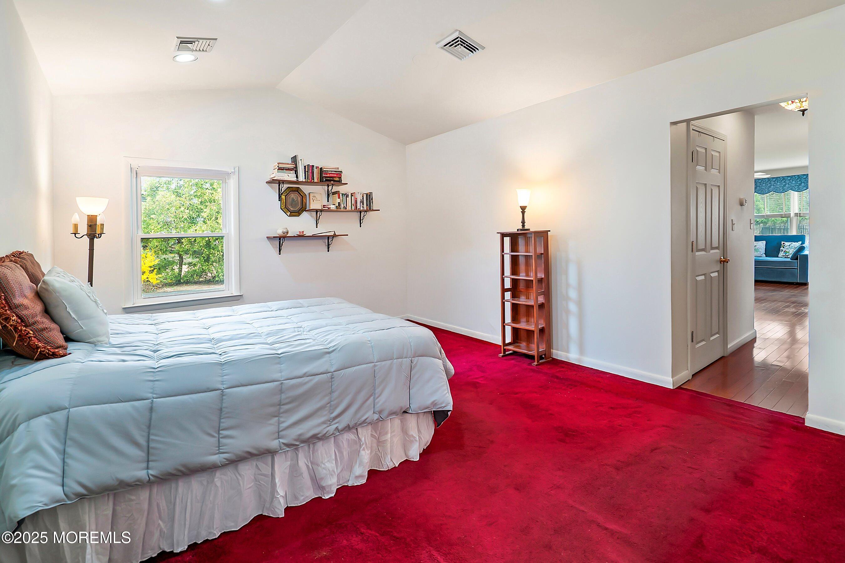 29 Holland Road Middletown, NJ 07748 - Photo 35 of 59 a bedroom with a bed and a large window