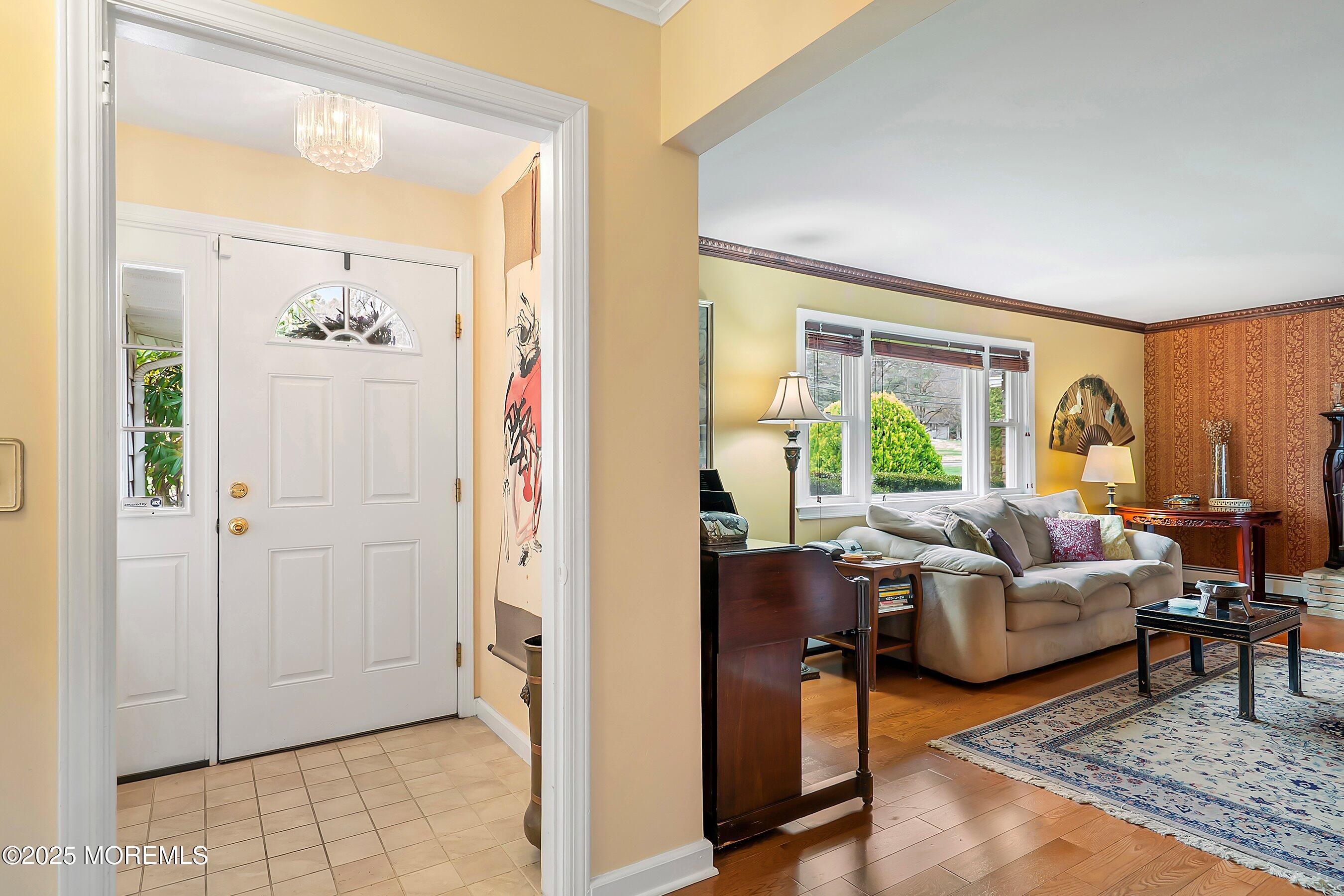 29 Holland Road Middletown, NJ 07748 - Photo 4 of 59 a living room with furniture and a large window