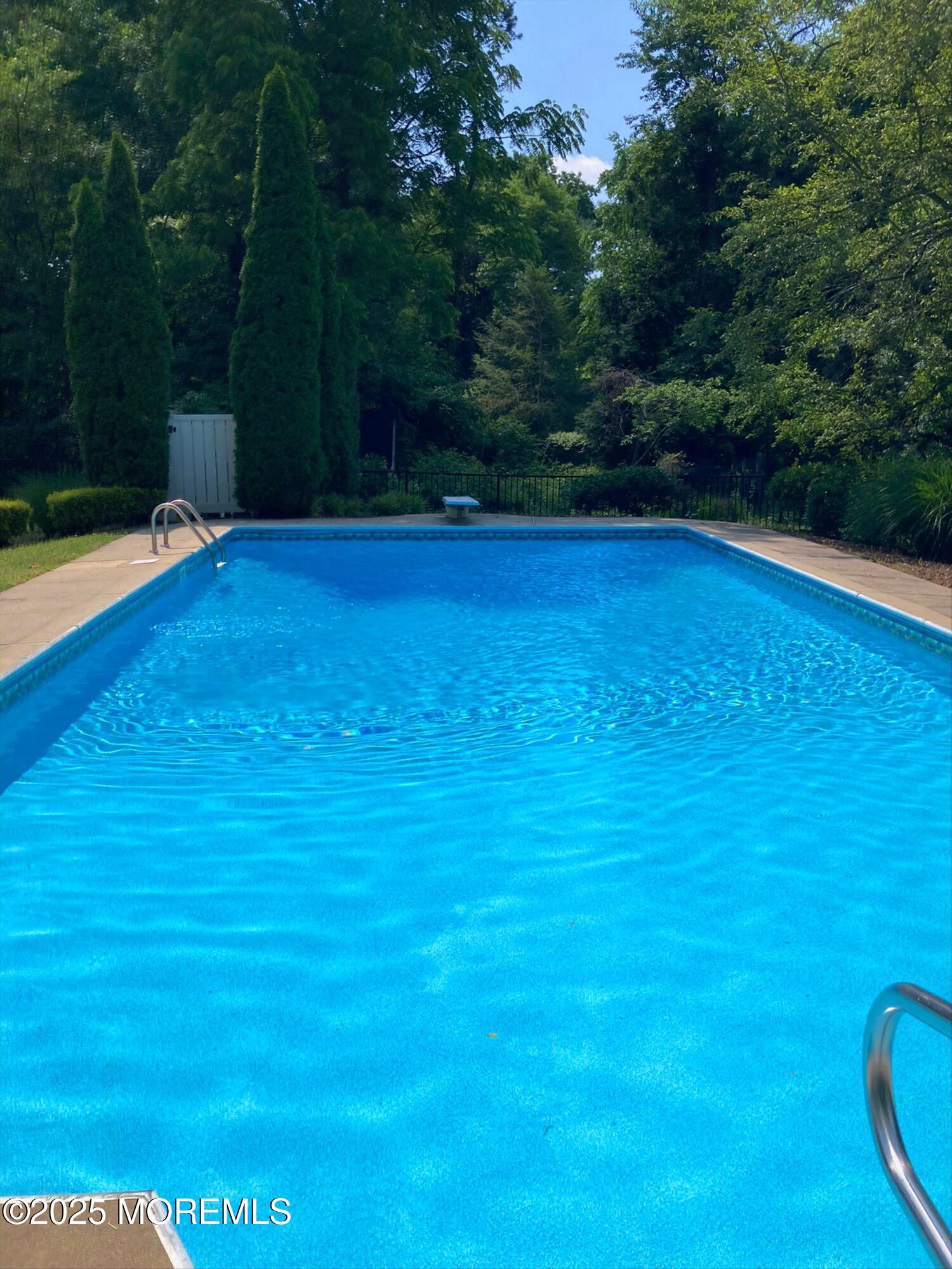 29 Holland Road Middletown, NJ 07748 - Photo 46 of 59 a view of a swimming pool with an outdoor space