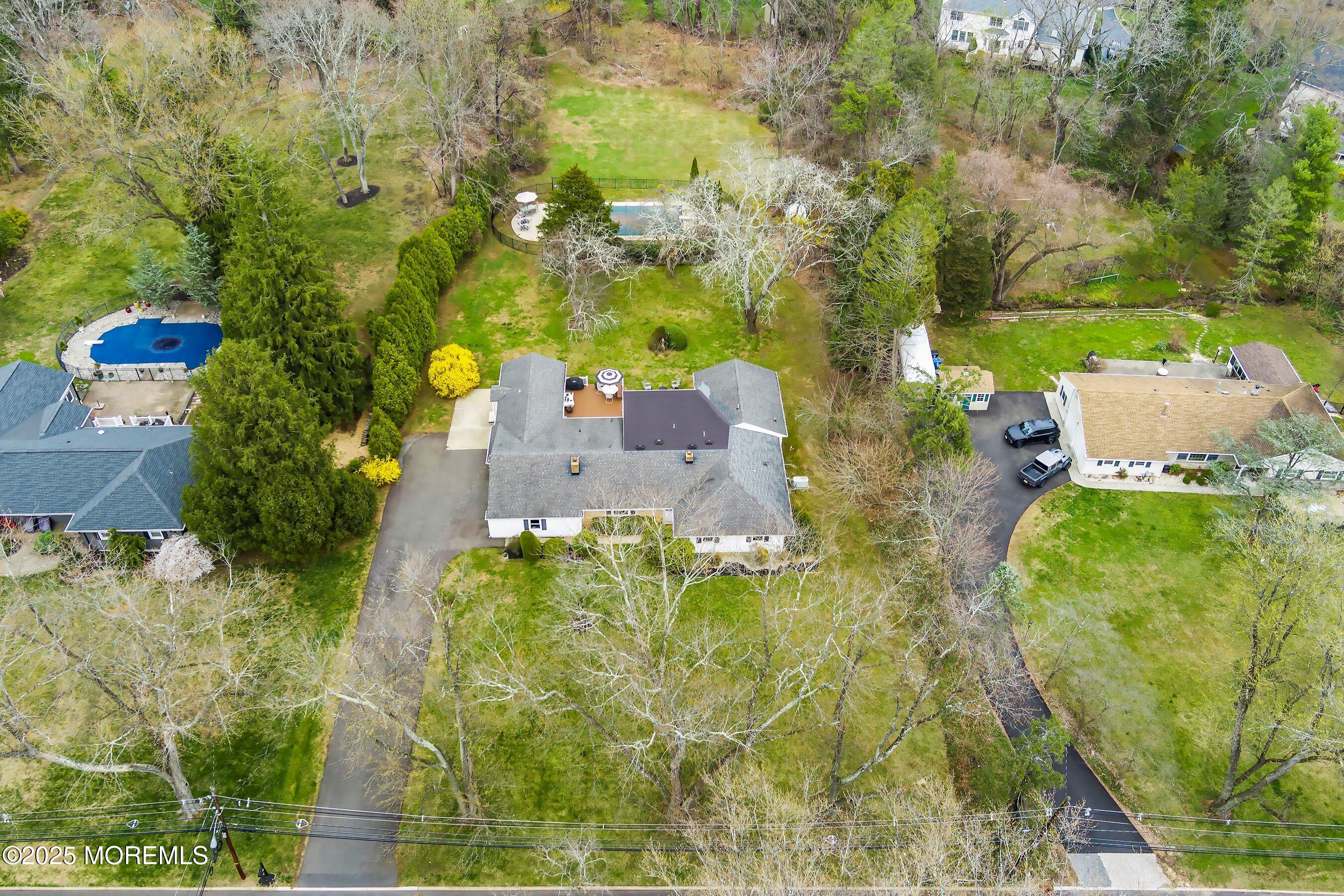 29 Holland Road Middletown, NJ 07748 - Photo 53 of 59 an aerial view of residential house with an outdoor space