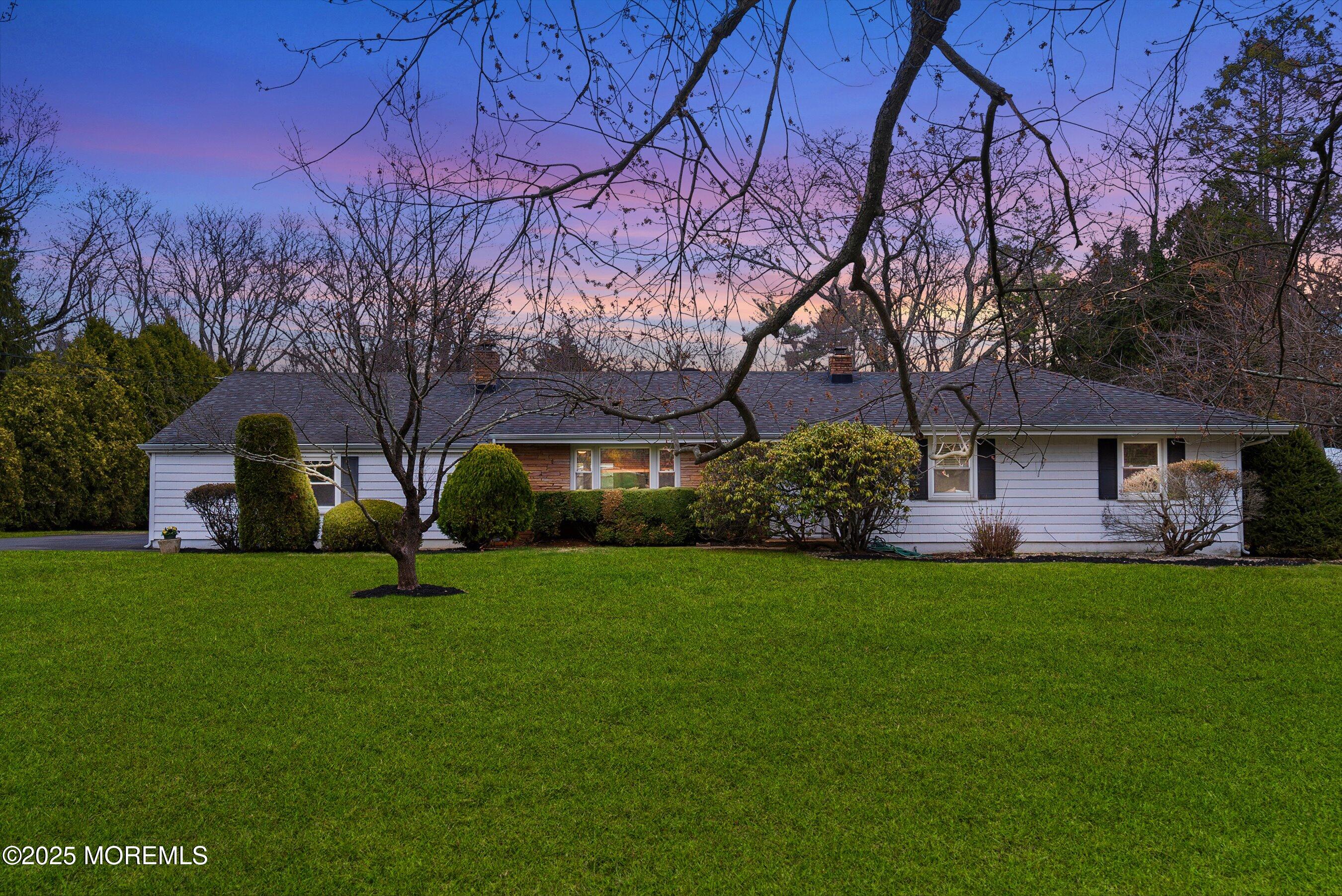 29 Holland Road Middletown, NJ 07748 - Photo 58 of 59 a view of a house with a big yard