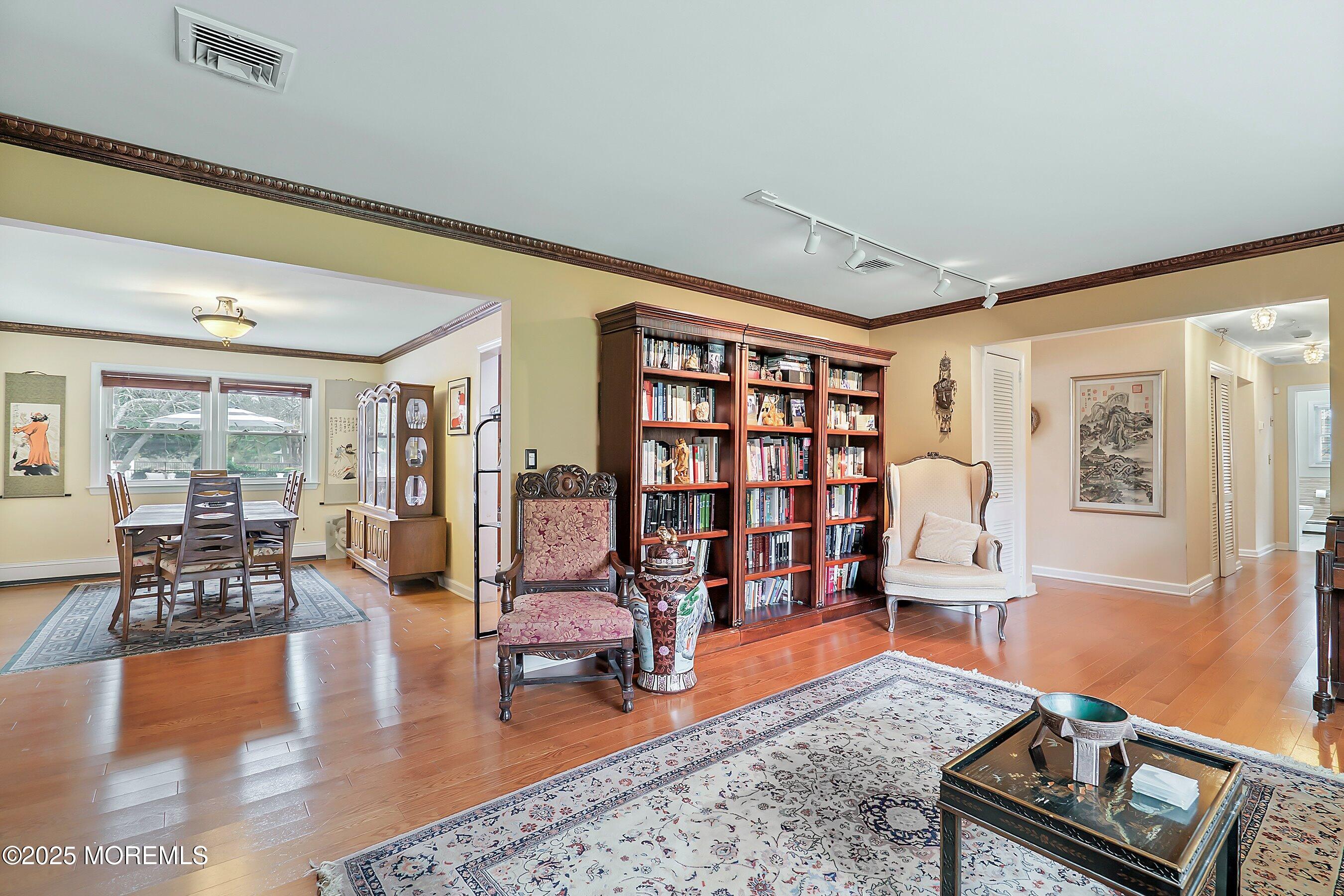 29 Holland Road Middletown, NJ 07748 - Photo 8 of 59 a living room with furniture and wooden floor