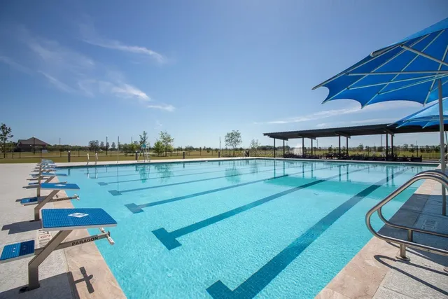 a front view of a house with swimming pool