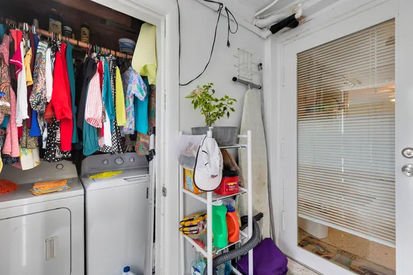 an aerial view of a houses with a yard
