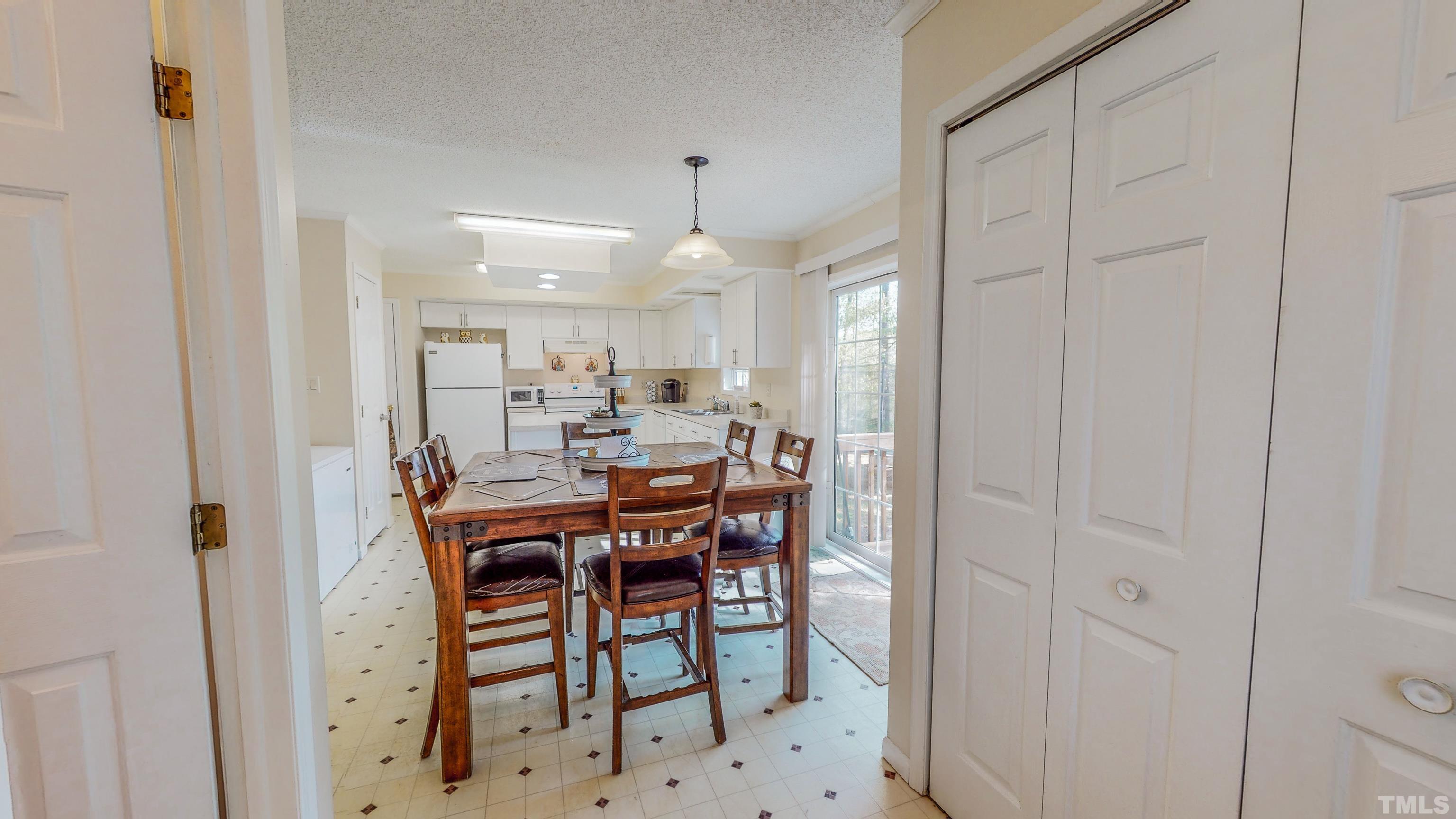 332 Little Creek Road Timberlake, NC 27583 - Photo 38 of 56 a view of a dining room with furniture