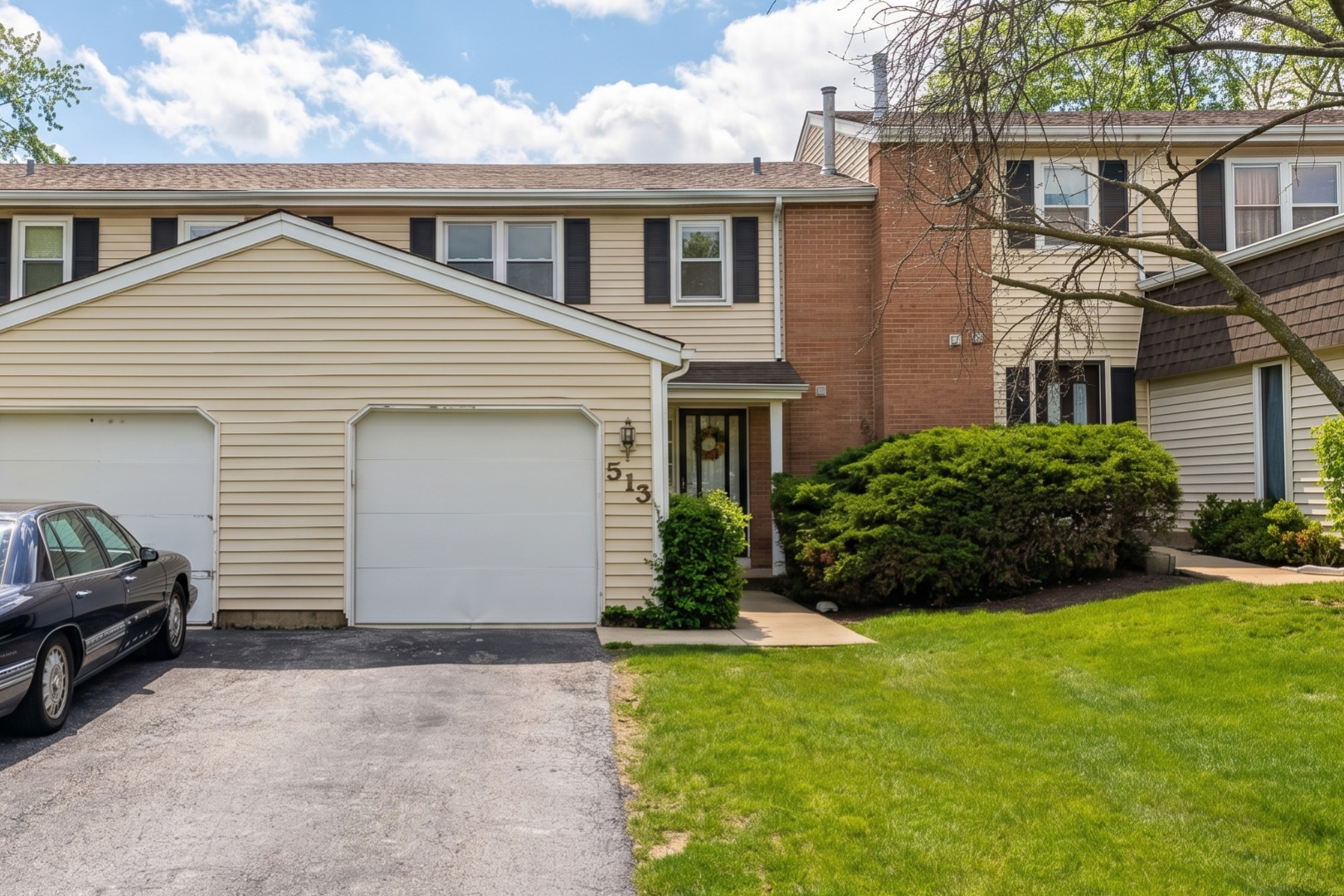 513 Monroe Road Bolingbrook, IL 60440 - Photo 1 of 21 a view of a white house next to a yard
