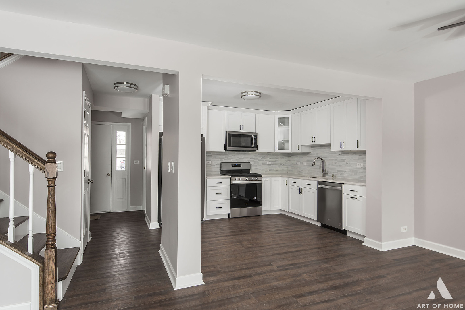 513 Monroe Road Bolingbrook, IL 60440 - Photo 4 of 21 a view of a kitchen with a stove top oven a refrigerator a sink and dishwasher with wooden floor