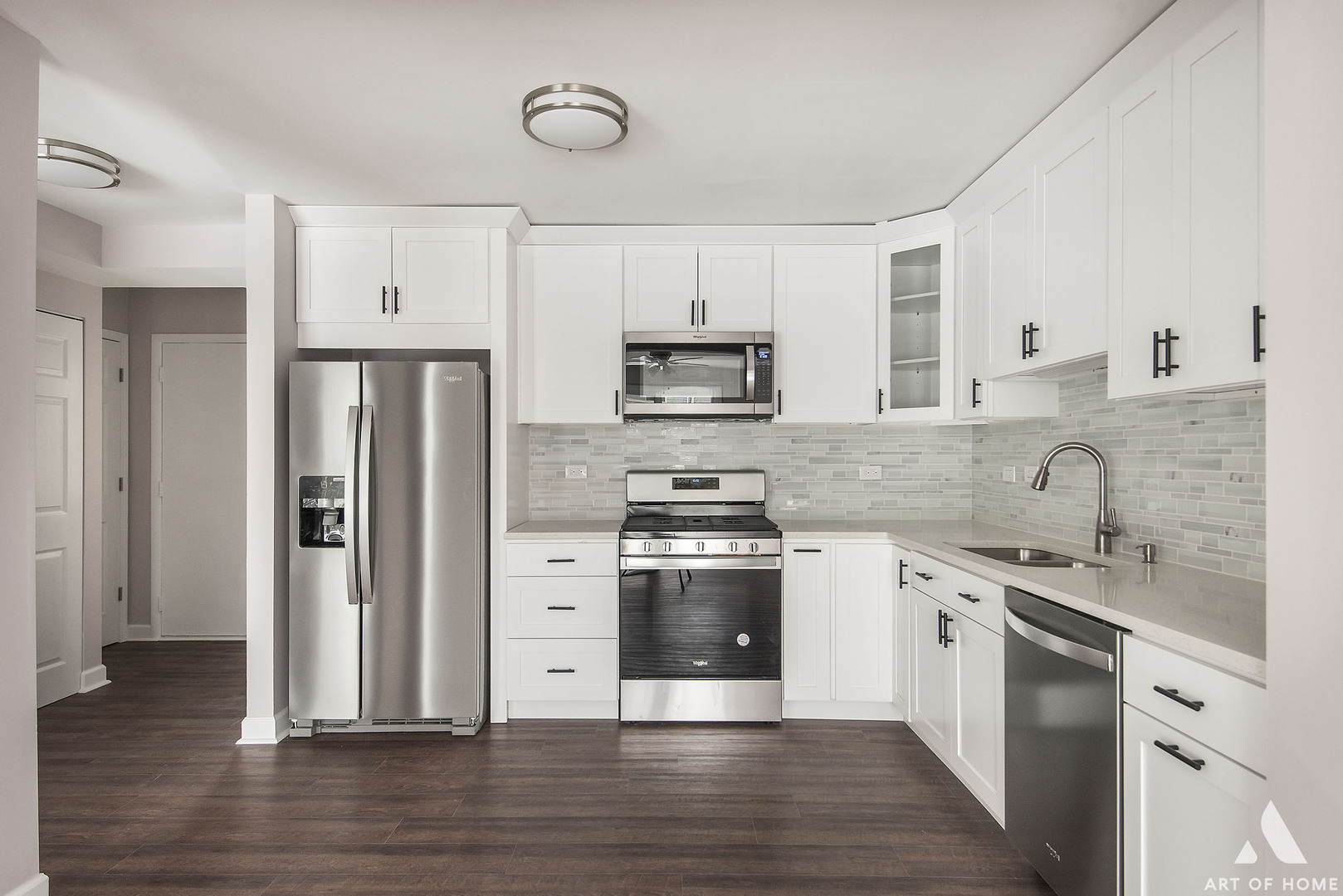 513 Monroe Road Bolingbrook, IL 60440 - Photo 5 of 21 a kitchen with stainless steel appliances granite countertop a stove a sink and a refrigerator