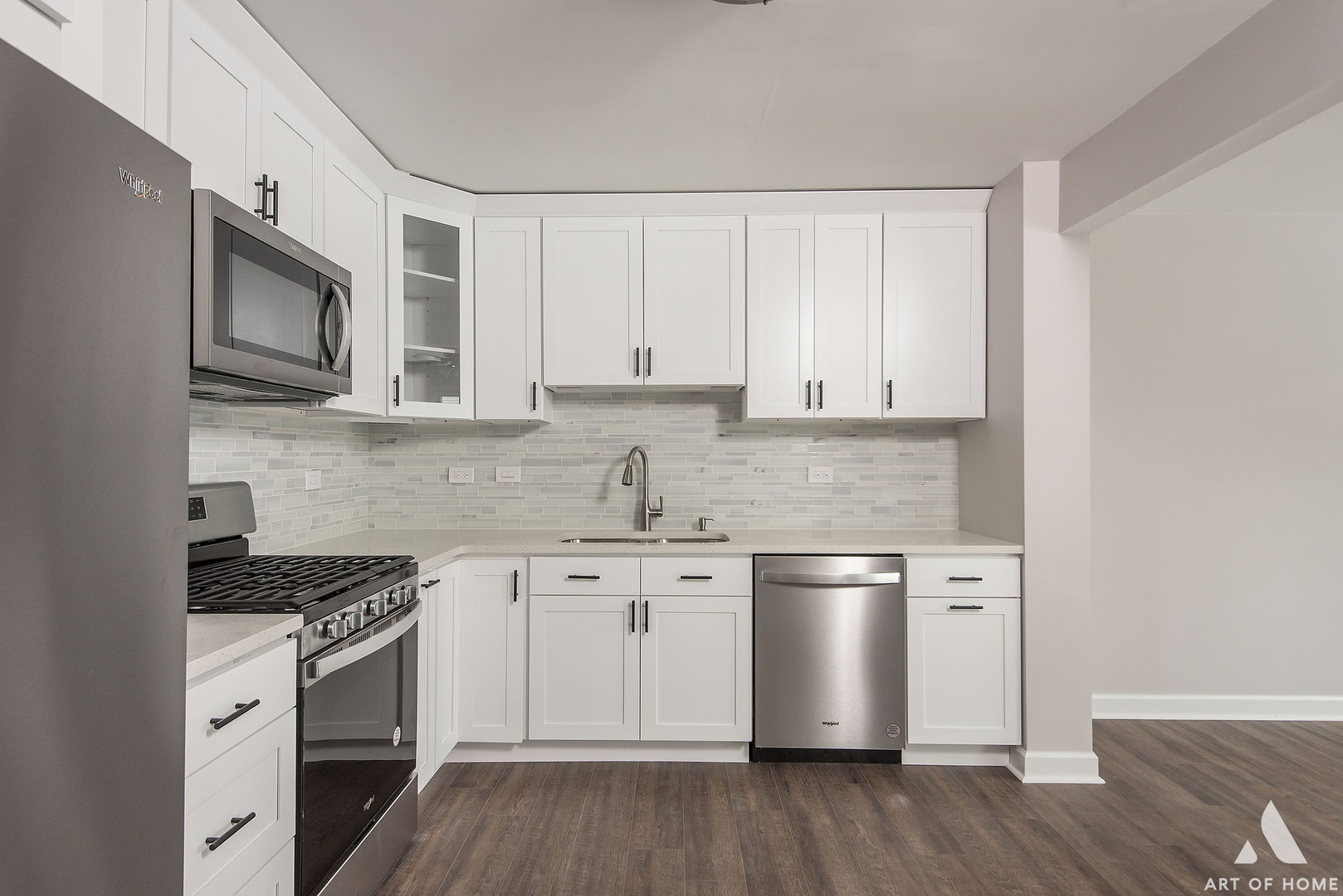 513 Monroe Road Bolingbrook, IL 60440 - Photo 6 of 21 a kitchen with stainless steel appliances granite countertop a stove a sink and a microwave