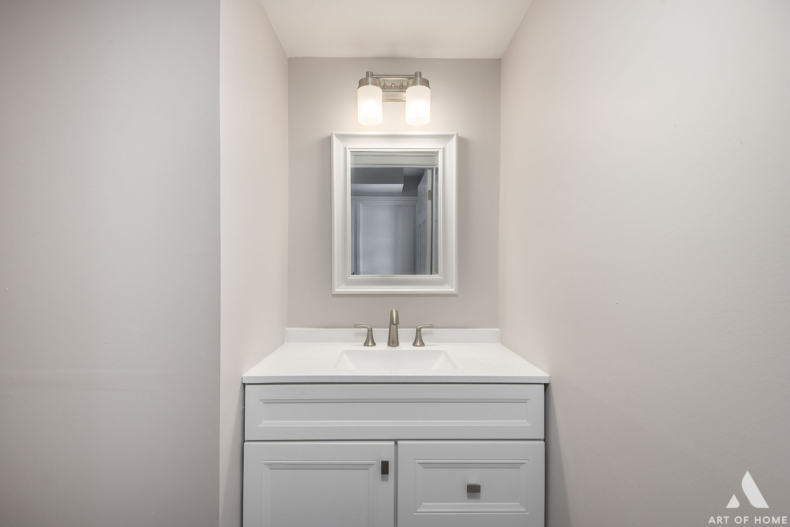 513 Monroe Road Bolingbrook, IL 60440 - Photo 8 of 21 a bathroom with a sink and a mirror