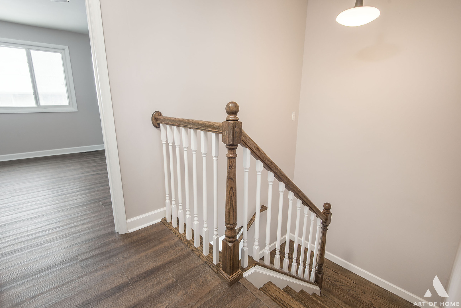 513 Monroe Road Bolingbrook, IL 60440 - Photo 9 of 21 a view of a hallway with wooden floor and staircase
