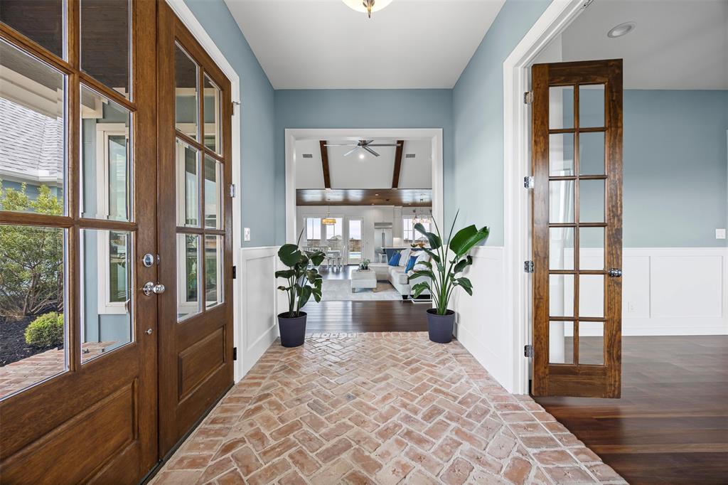 4421 Azalea Way Midlothian, TX 76065 - Photo 4 of 38 Foyer featuring french doors, a wainscoted wall, a decorative wall, brick flooring, and a ceiling fan