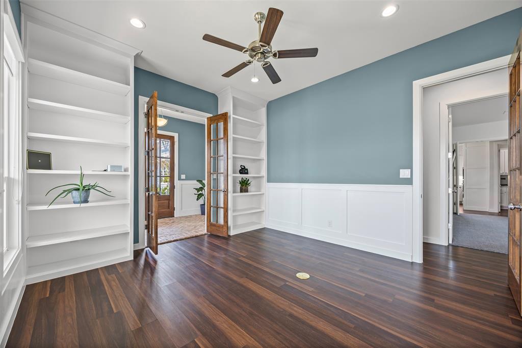 4421 Azalea Way Midlothian, TX 76065 - Photo 5 of 38 Unfurnished room with dark wood-style flooring, ceiling fan, recessed lighting, french doors, and wainscoting