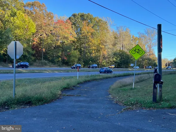 a view of a patio with a yard