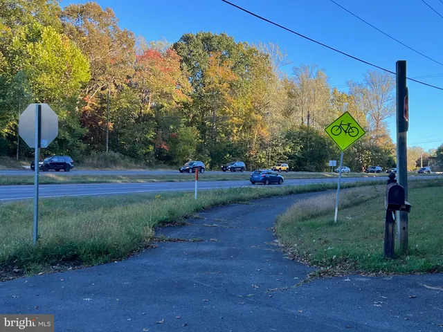 a view of a patio with a yard