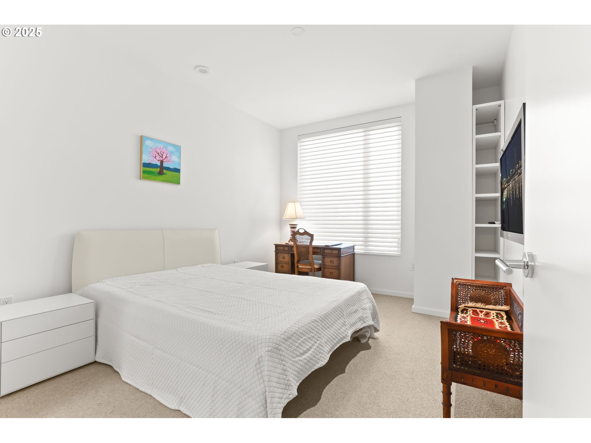1150 Northwest Quimby Street, Unit 442 Portland, OR 97209 - Photo 23 of 47 a bedroom with a bed and a couch