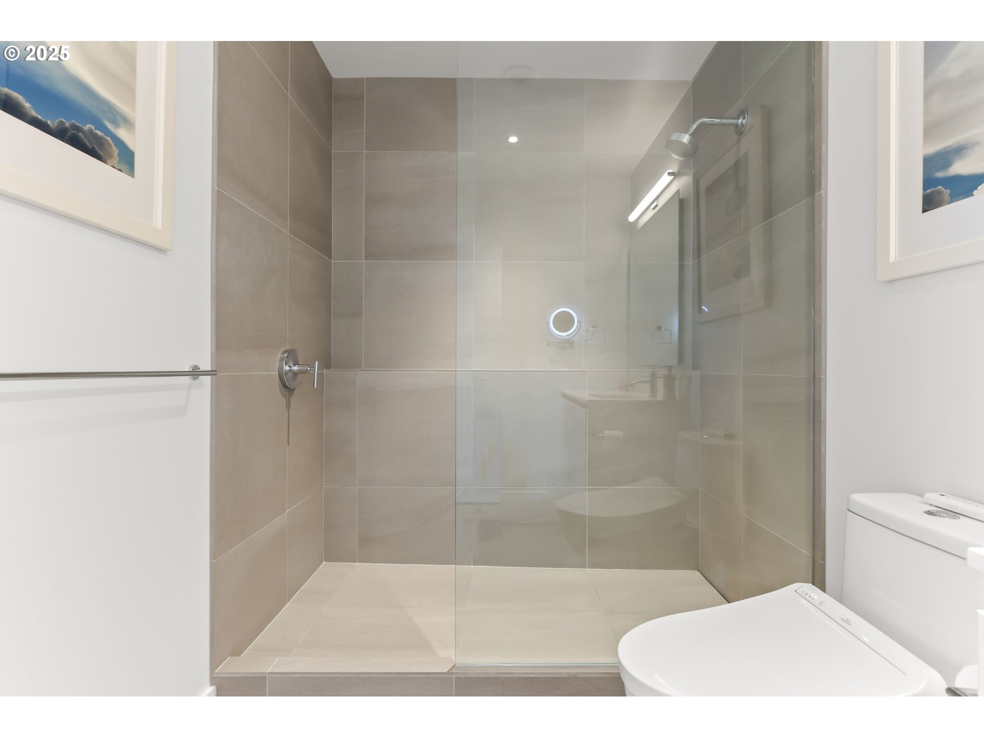 1150 Northwest Quimby Street, Unit 442 Portland, OR 97209 - Photo 32 of 47 a bathroom with a bathtub and a shower