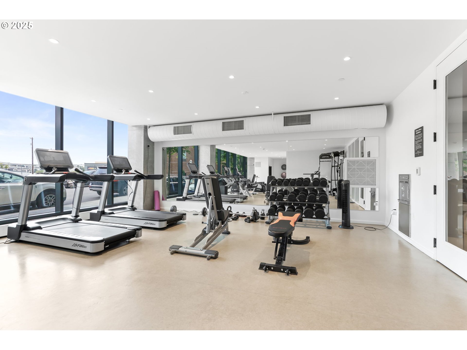 1150 Northwest Quimby Street, Unit 442 Portland, OR 97209 - Photo 38 of 47 a view of a room with gym equipment
