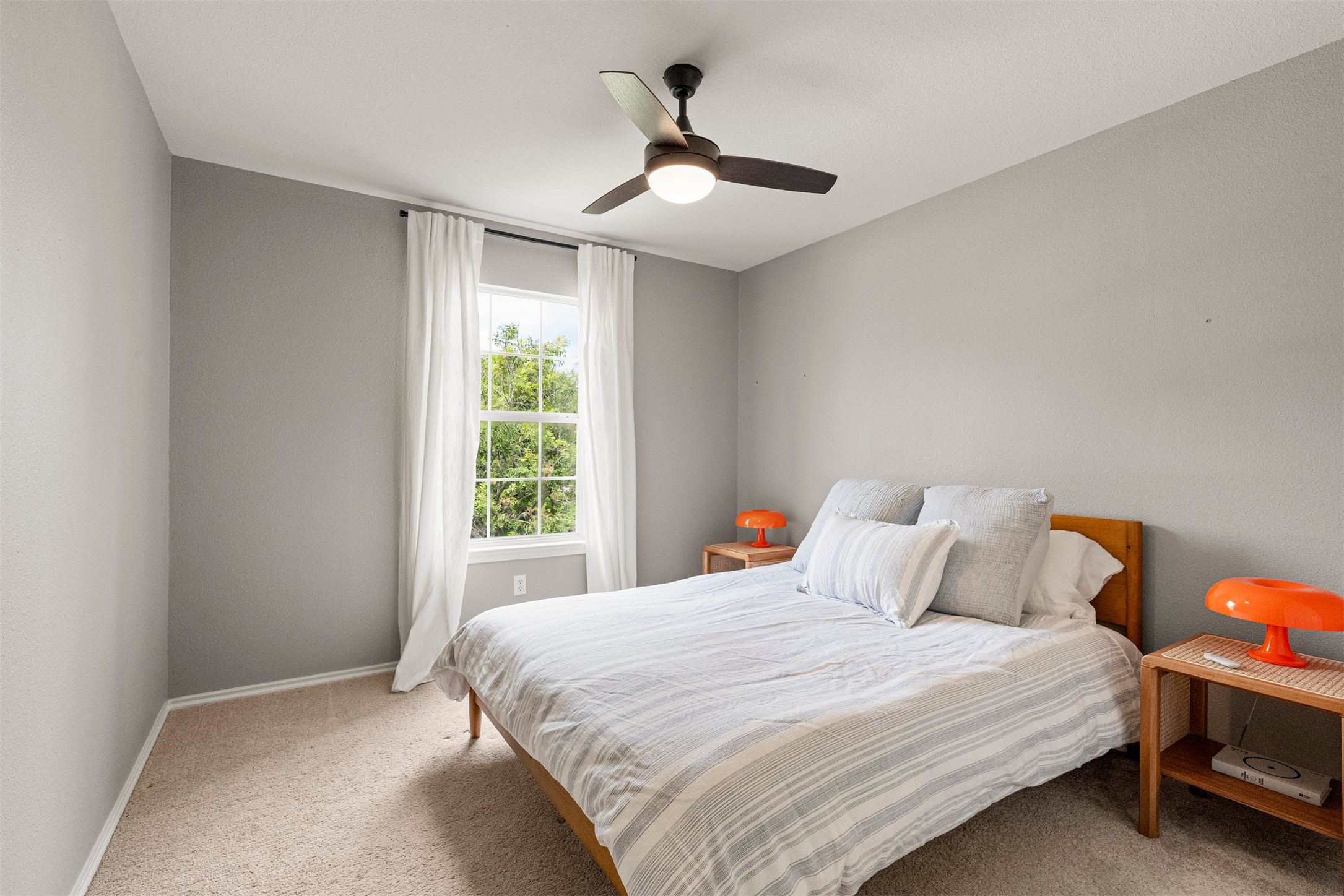 7009 Wandering Oak Road Austin, TX 78749 - Photo 29 of 36 This guest room is a cozy spot for visitors to settle in and enjoy a peaceful night's stay