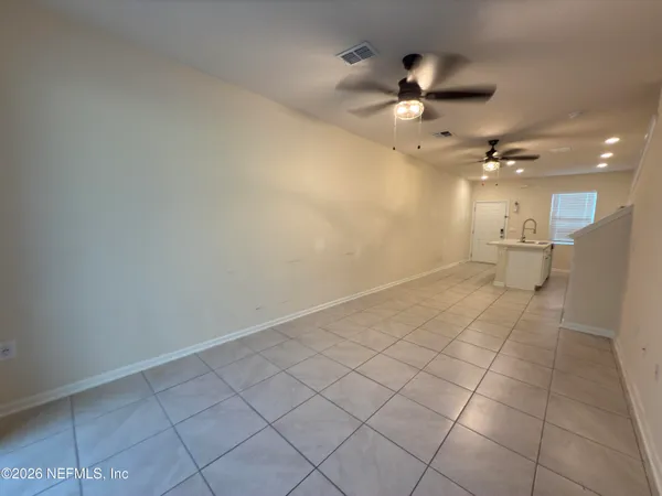 a view of an empty room and window