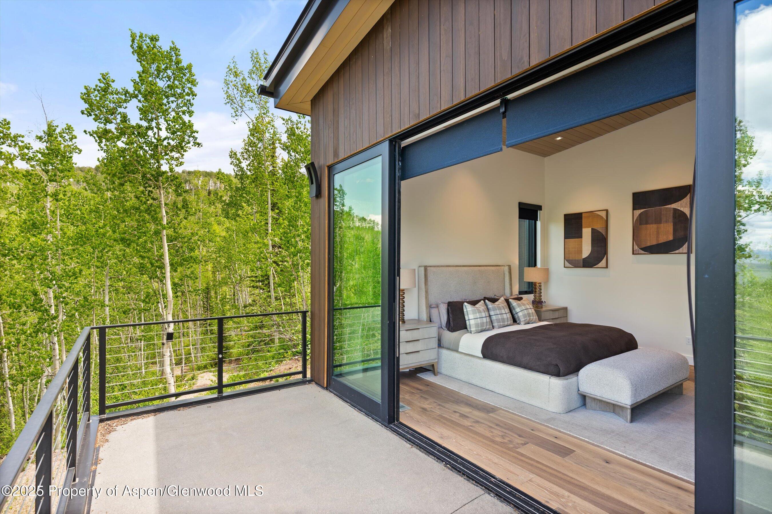 1234 Wood Road Snowmass Village, CO 81615 - Photo 40 of 66 a view of a porch with furniture