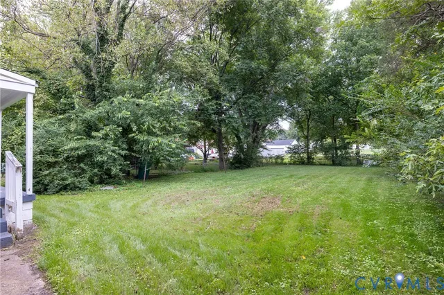 a view of a yard with a trees