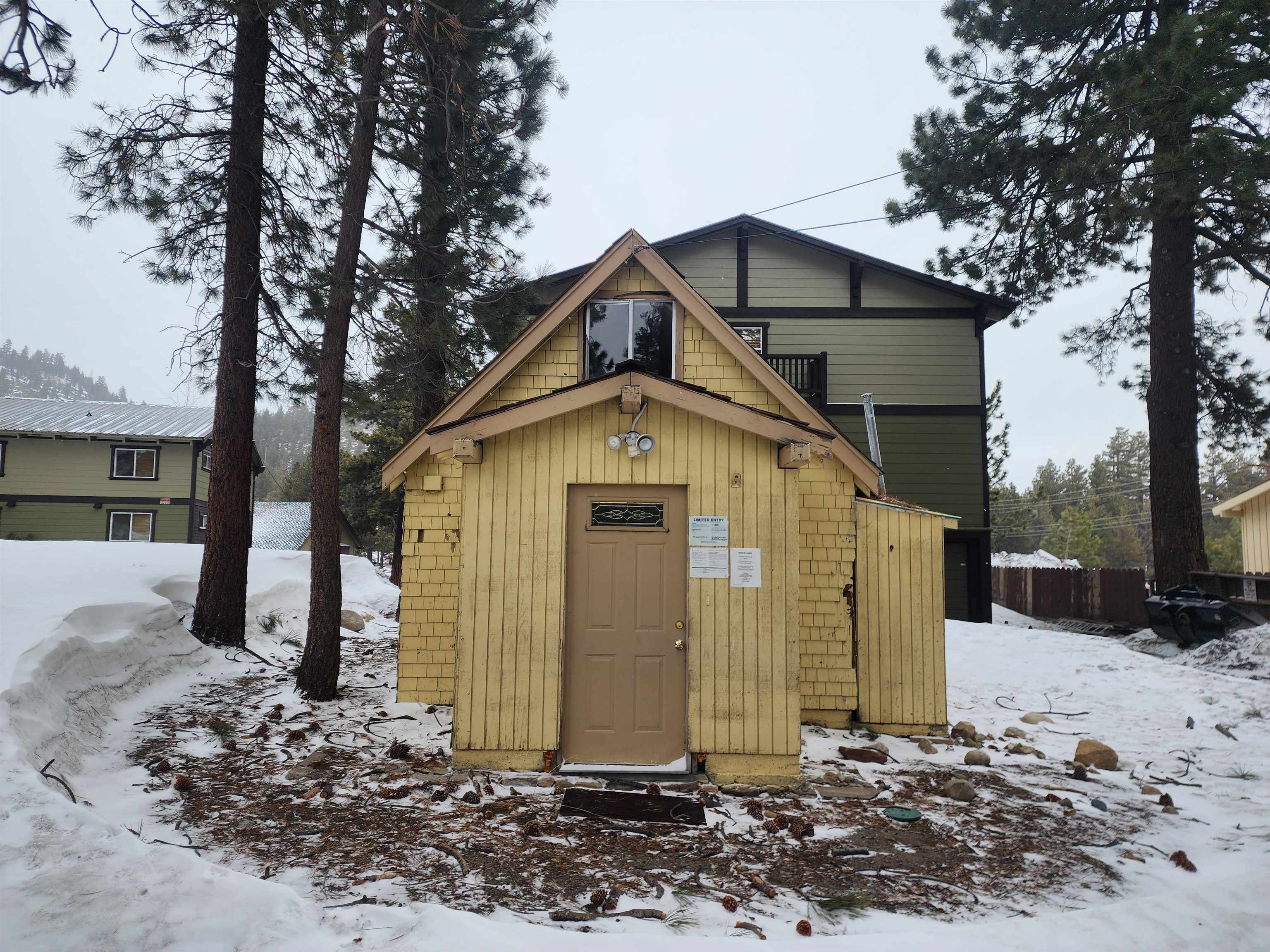 72 Laurel Mountain Road Mammoth Lakes, CA 93546 - Photo 17 of 27 a front view of a house with a yard