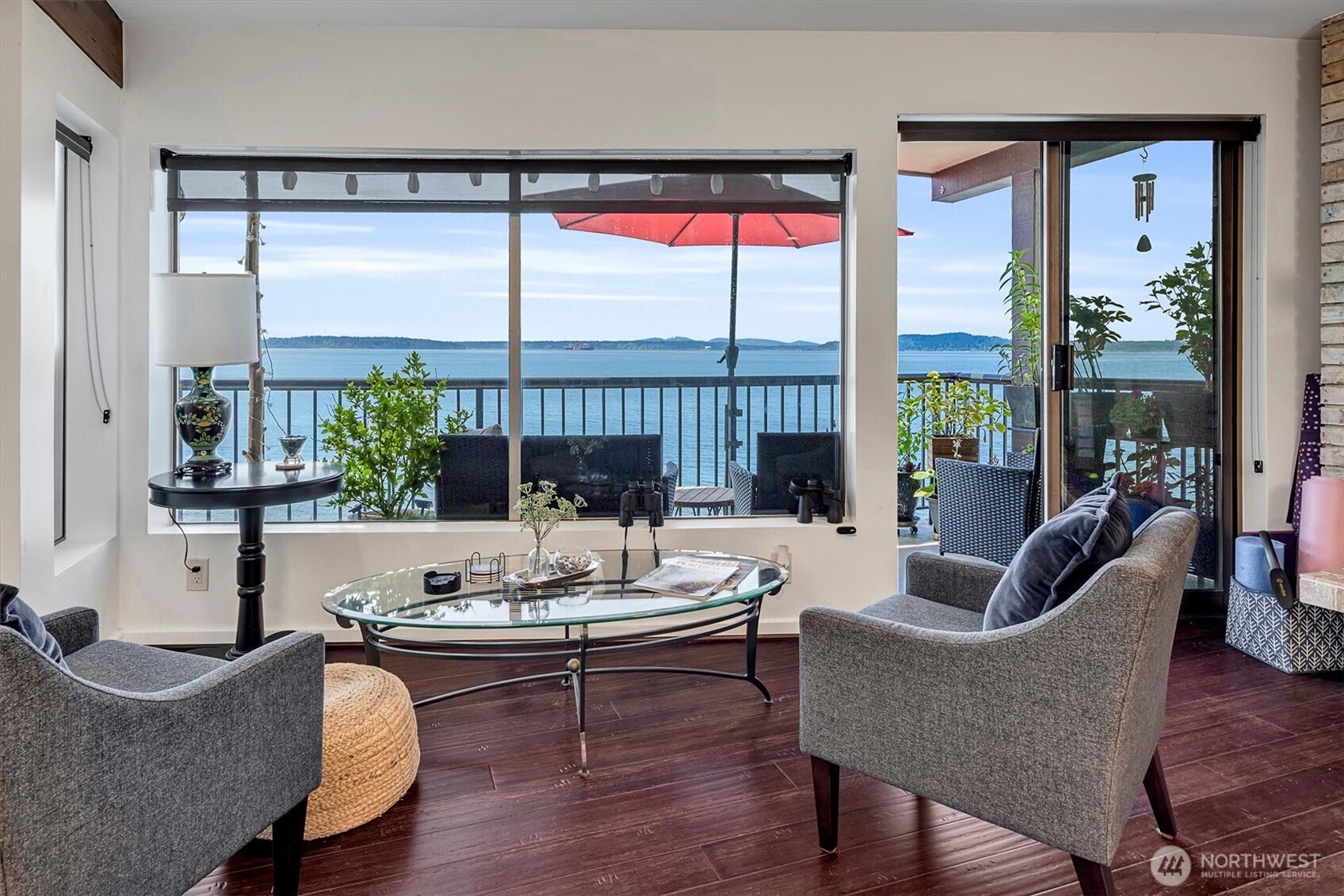 4131 Beach Drive Southwest Seattle, WA 98116 - Photo 21 of 40 a living room with furniture and a large window