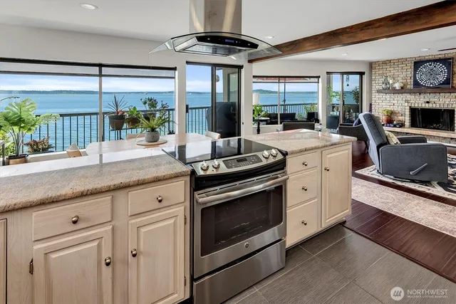 a bed room with a bed and a chair