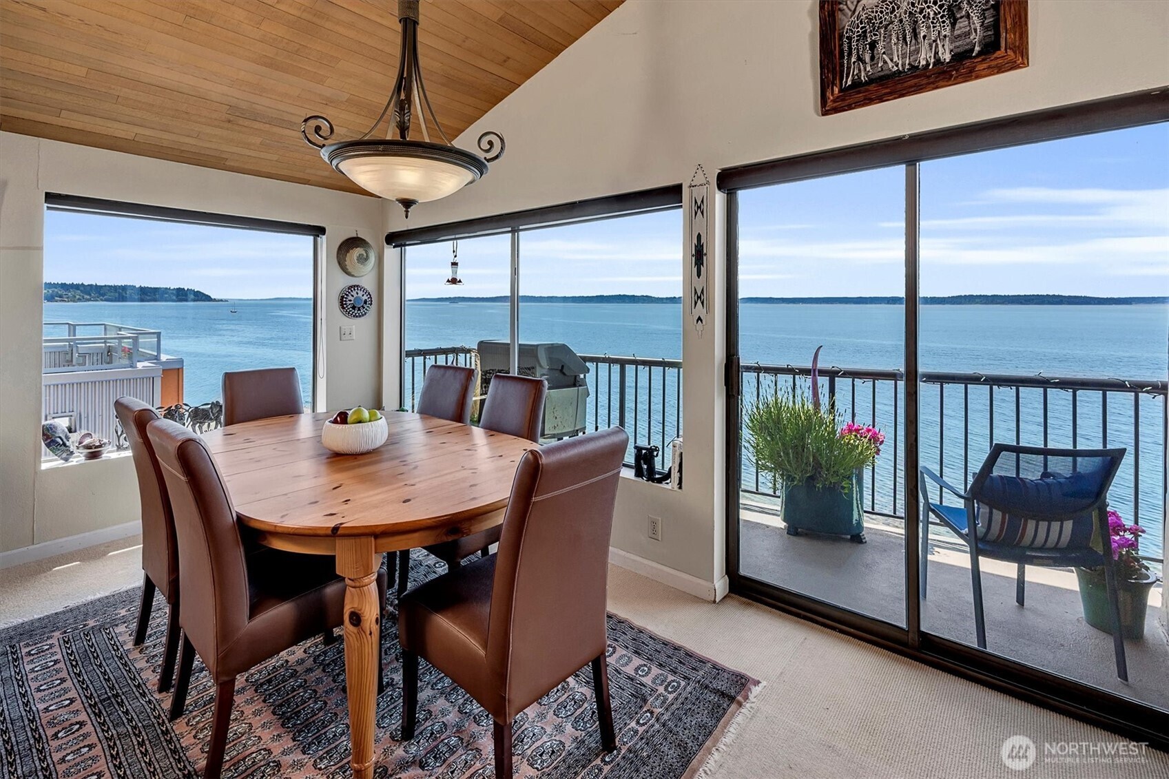 4131 Beach Drive Southwest Seattle, WA 98116 - Photo 34 of 40 a view of a dining room with furniture window and outside view