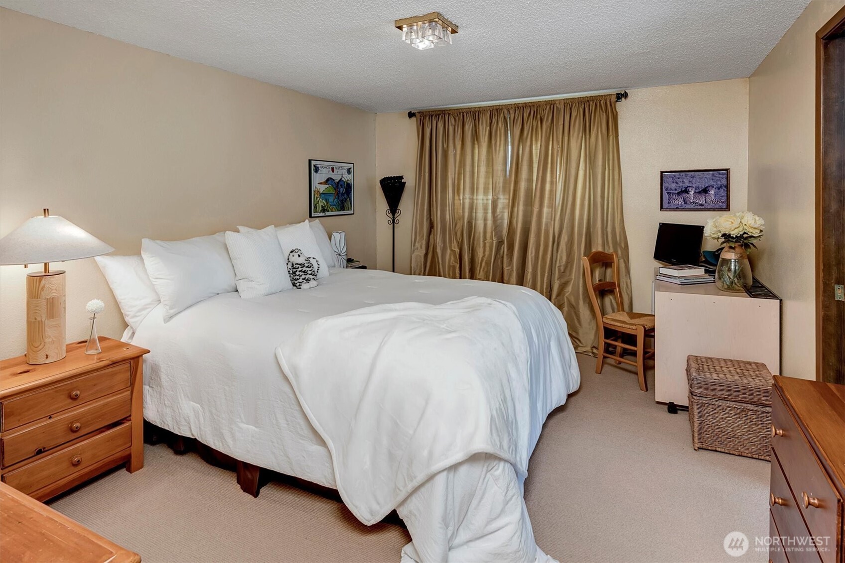 4131 Beach Drive Southwest Seattle, WA 98116 - Photo 36 of 40 a bed room with a bed and a chair