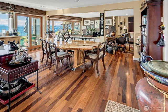 a view of a room with wooden floor and balcony