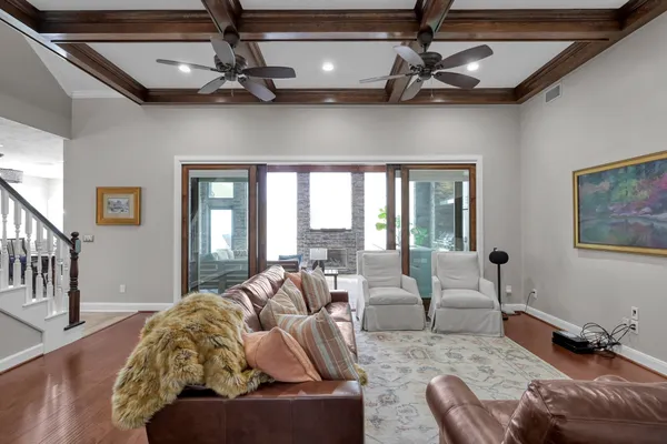 a kitchen with wooden cabinets and stainless steel appliances