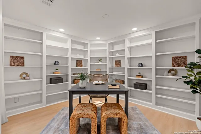 a view of a workspace with furniture