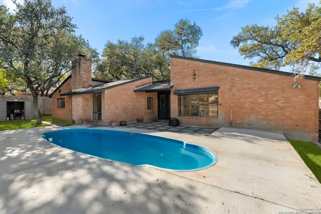 a view of outdoor space yard and swimming pool