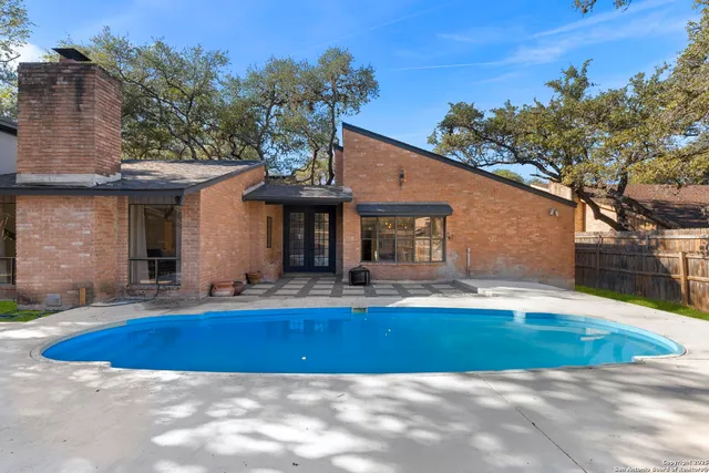 a view of outdoor space yard and swimming pool