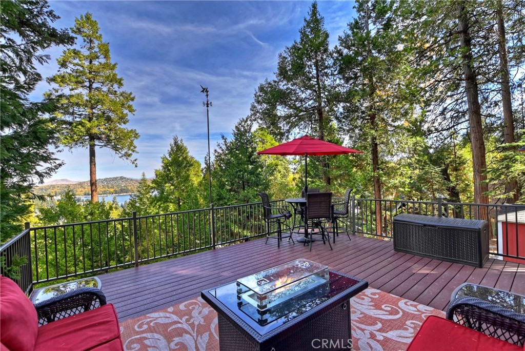 329 Summit Road Lake Arrowhead, CA 92352 - Photo 36 of 61 an outdoor sitting area with furniture and wooden deck