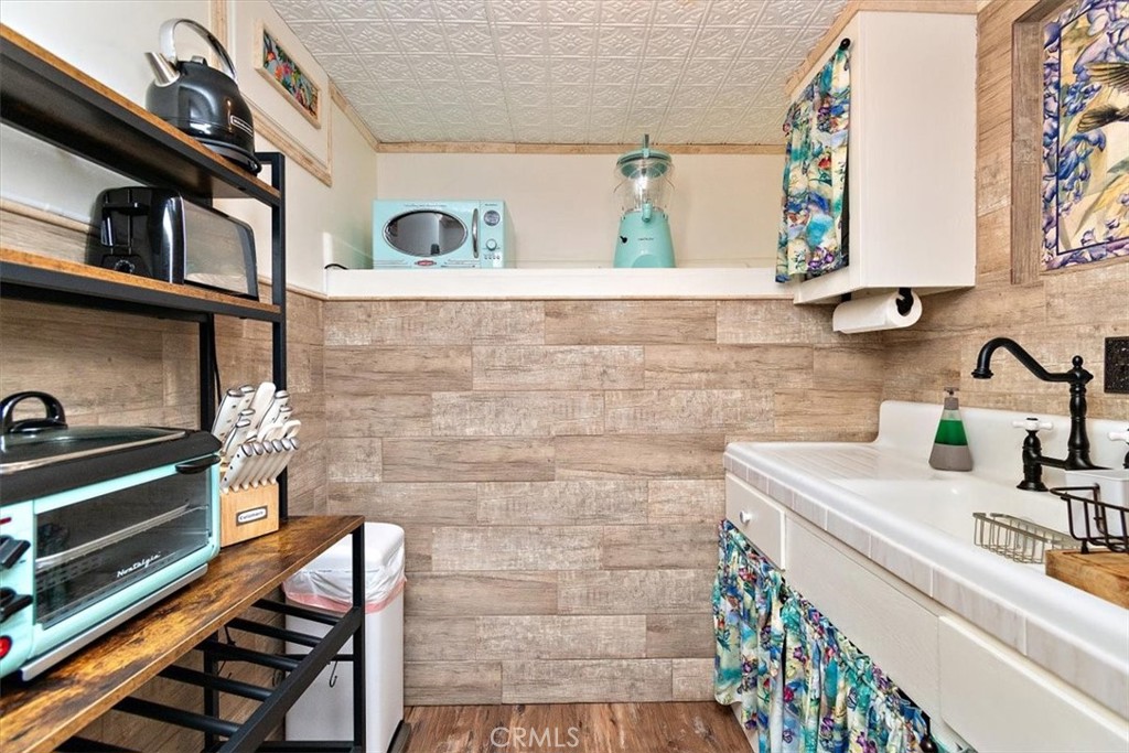 329 Summit Road Lake Arrowhead, CA 92352 - Photo 46 of 61 a bathroom with a sink and a mirror