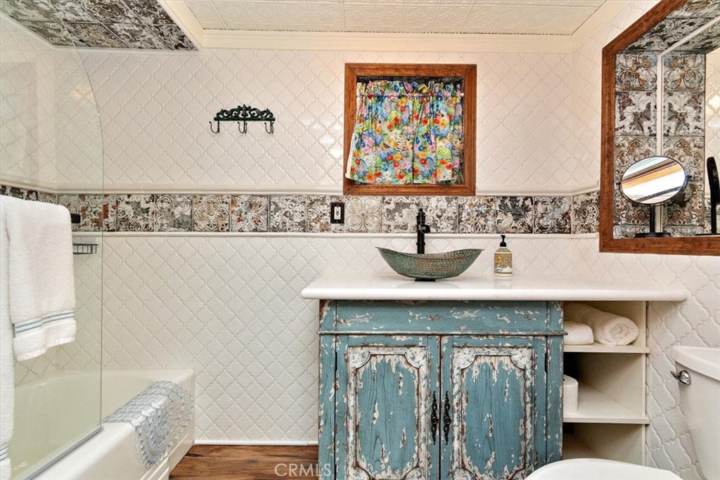 329 Summit Road Lake Arrowhead, CA 92352 - Photo 47 of 61 a bathroom with a sink and a mirror