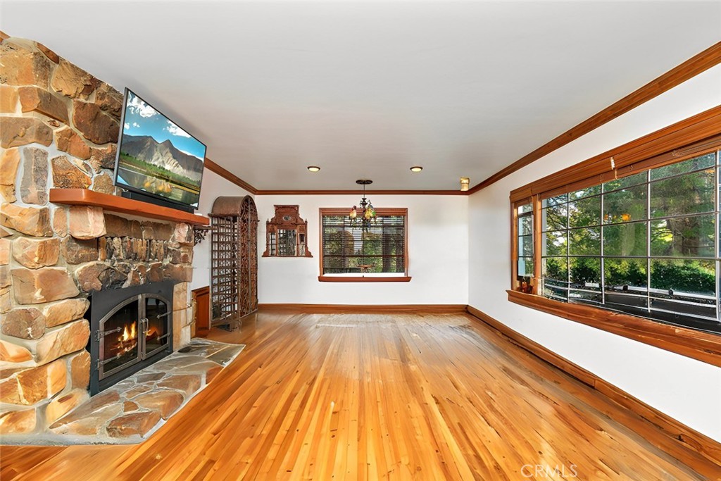 329 Summit Road Lake Arrowhead, CA 92352 - Photo 9 of 61 a view of empty room with floor to ceiling window dining room and kitchen