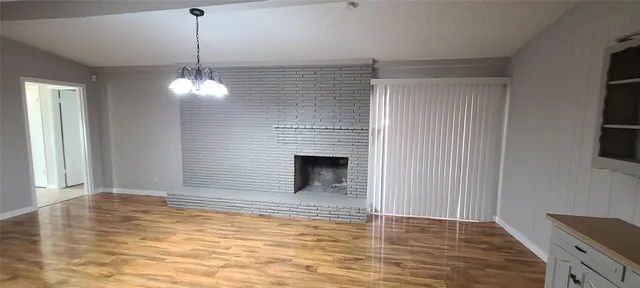 a kitchen with a sink and a refrigerator