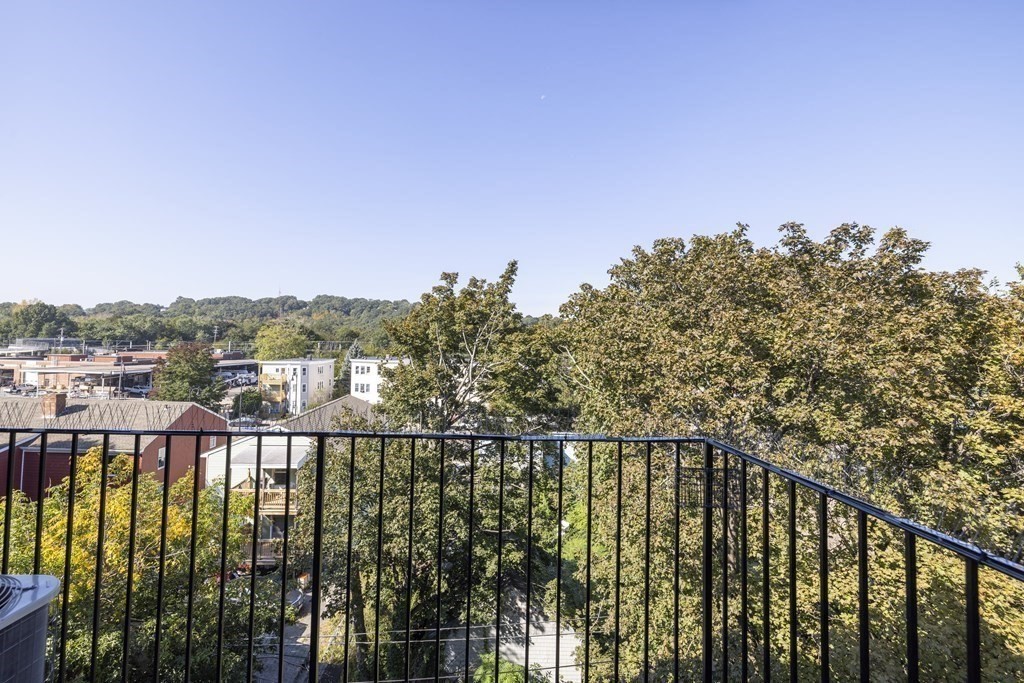 175 Clare Avenue, Unit E8 Boston, MA 02136 - Photo 11 of 16 a view of city and green space