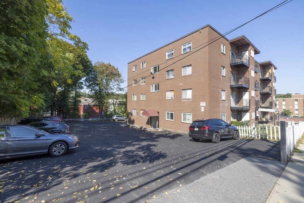 175 Clare Avenue, Unit E8 Boston, MA 02136 - Photo 15 of 16 a view of a parked cars in front of a building