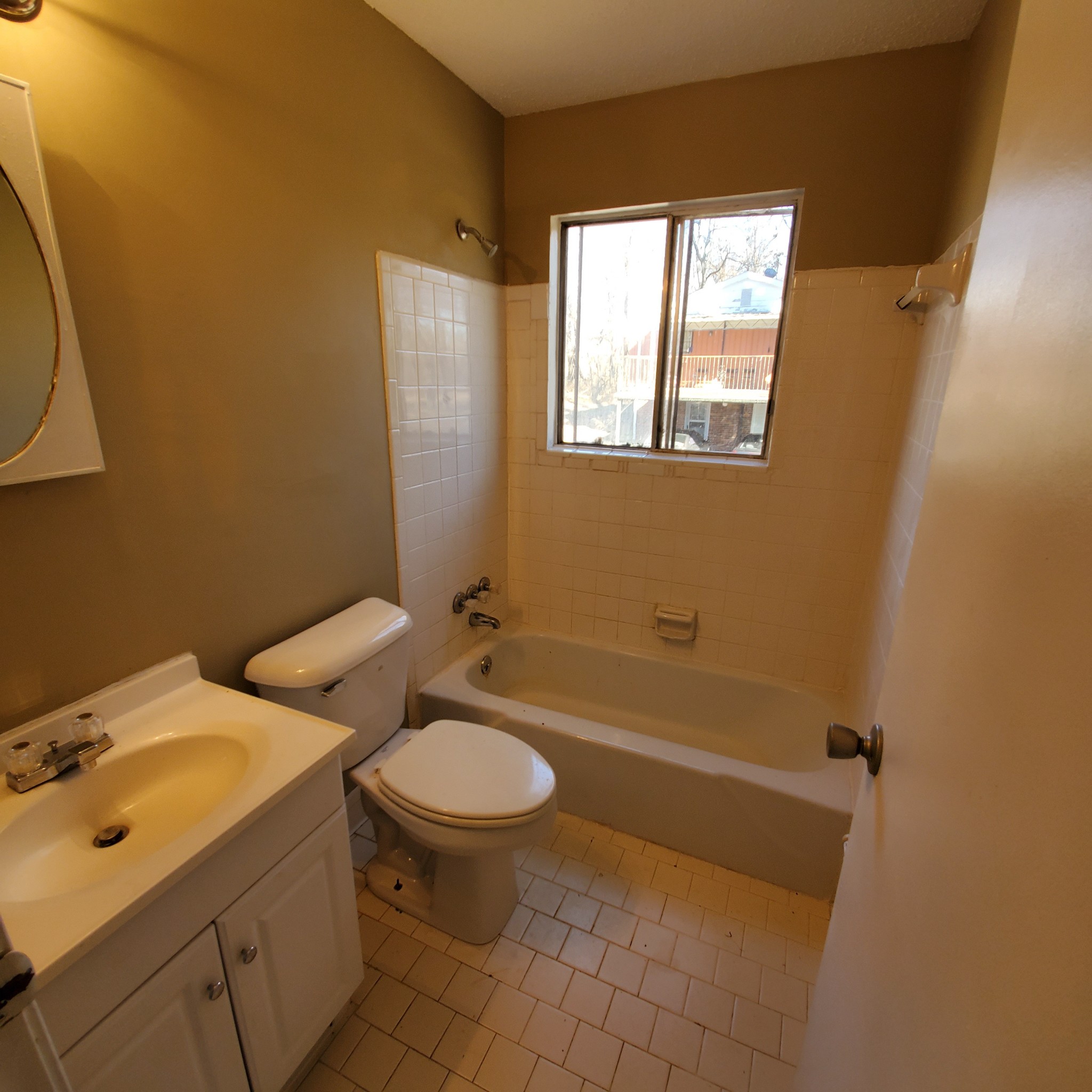 108 Airport Road Clarksville, TN 37042 - Photo 9 of 16 a bathroom with a sink toilet and shower