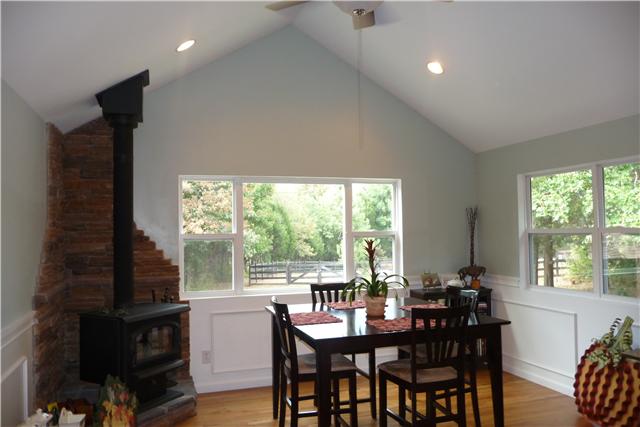 84 Fellowship Road Mount Juliet, TN 37122 - Photo 7 of 20 Great views from your dining area. Notice the cozy wood burning stove with Stone Surround